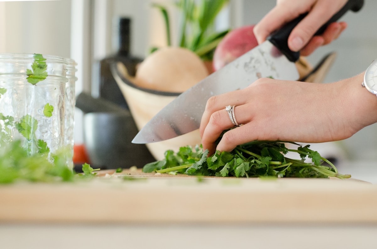 Organized meal prep containers with fresh vegetables and proteins
